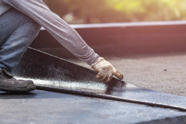 Professional Basement Waterproofing technician working in Sabina, OH